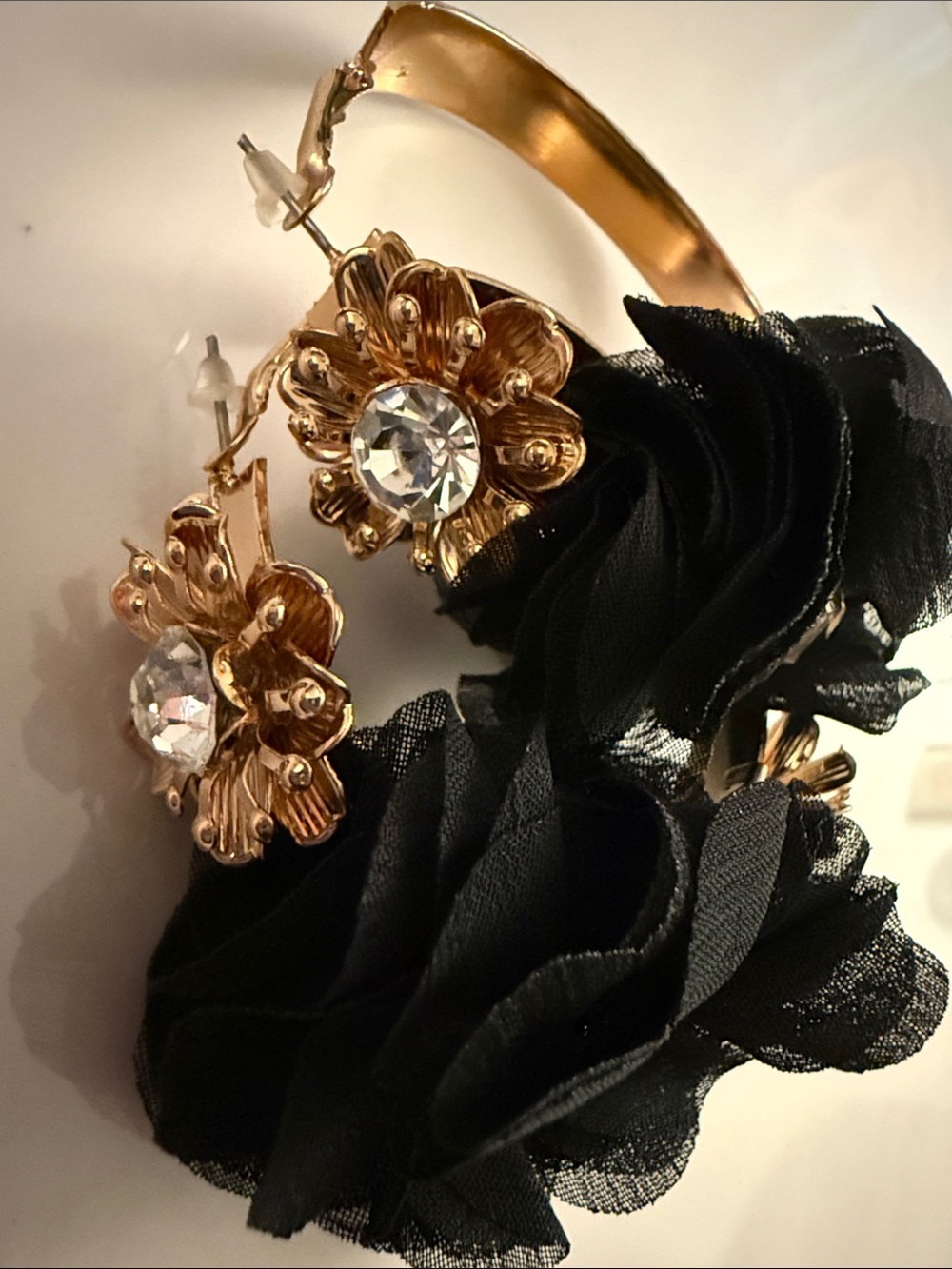 Gold Hoop Earrings with Black Floral Accents